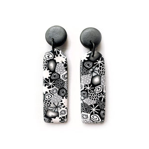 
            
                Load image into Gallery viewer, Monochrome Moulded Collage Narrow Arch Earrings
            
        